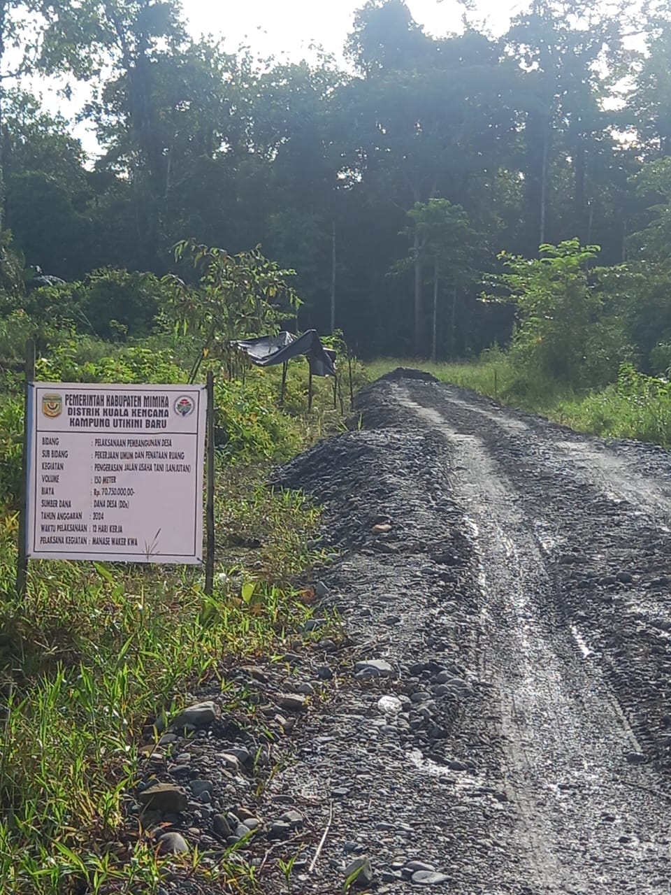 Penimbunan jalan tani